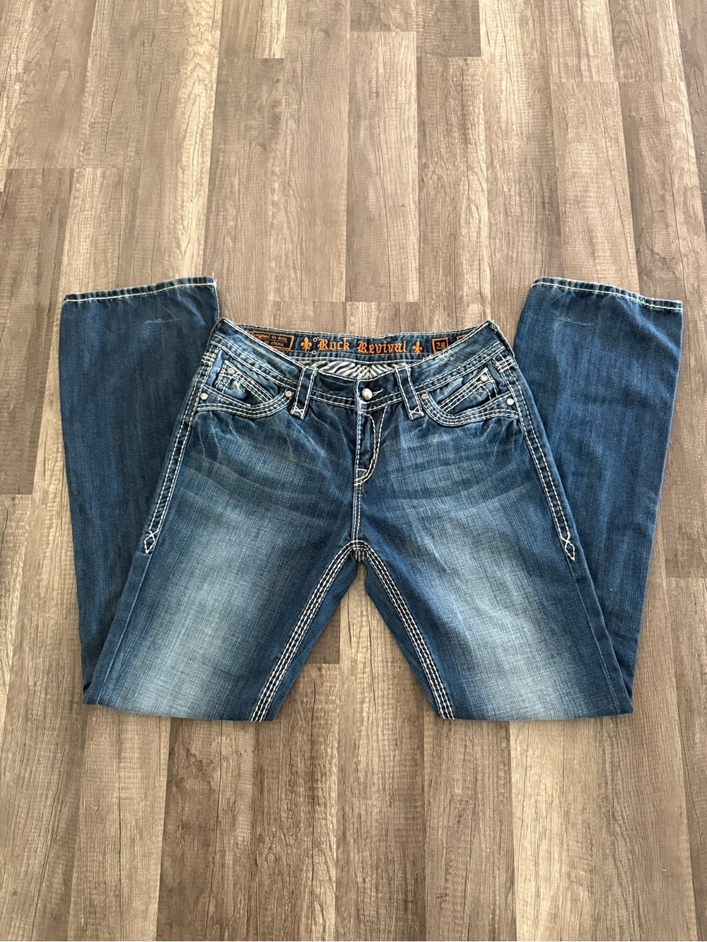 Rock Revival Women’s Blue Bootcut Jeans with Faded Wash